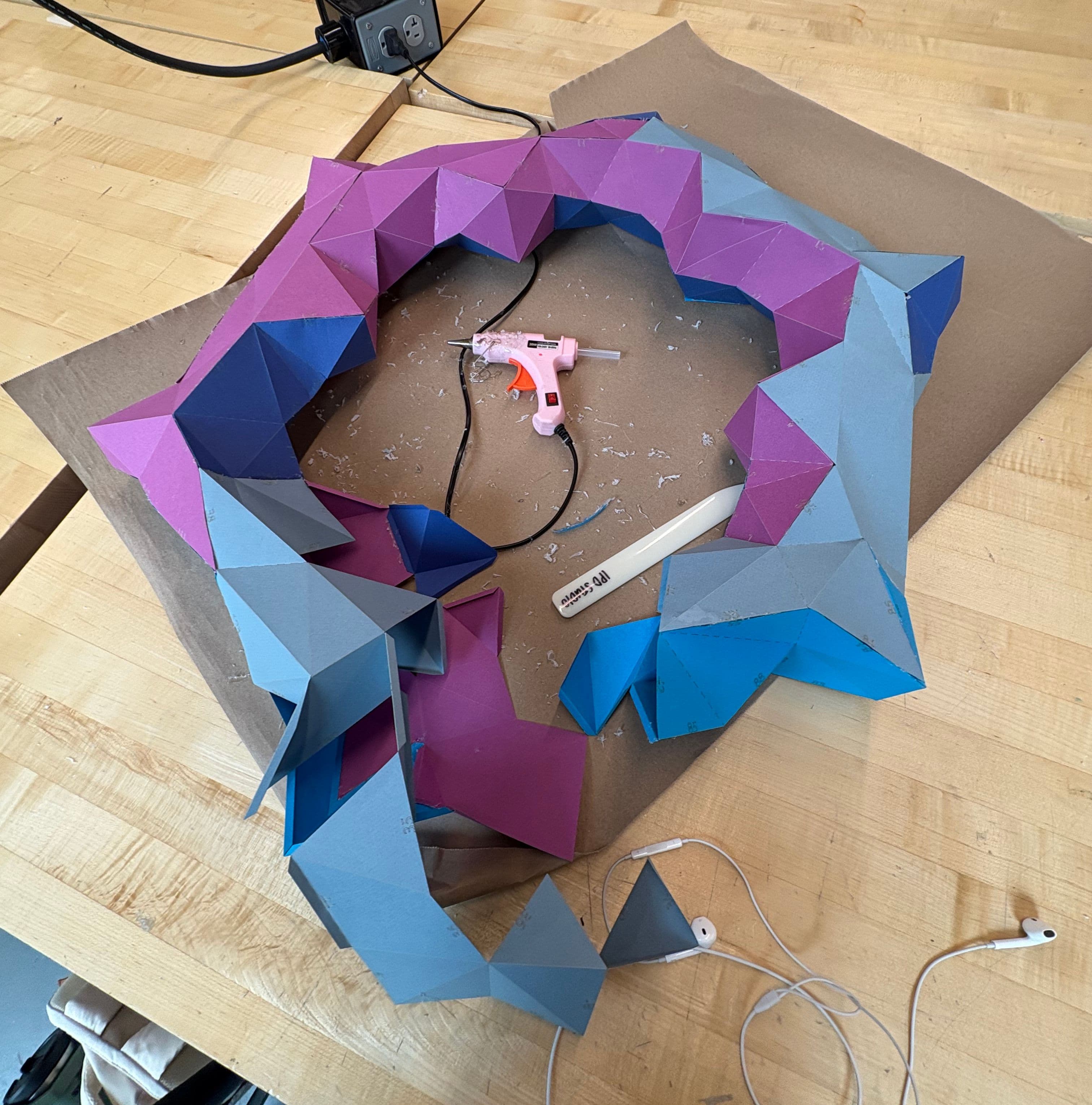Paper form during the folding and assembly process