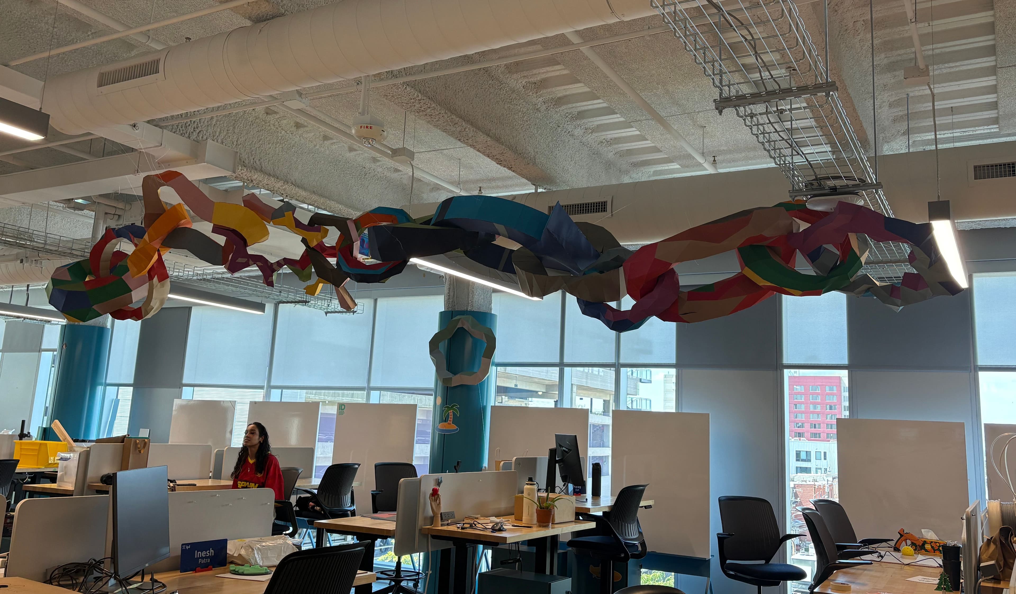 Collective suspended installation made from the class's folded paper forms