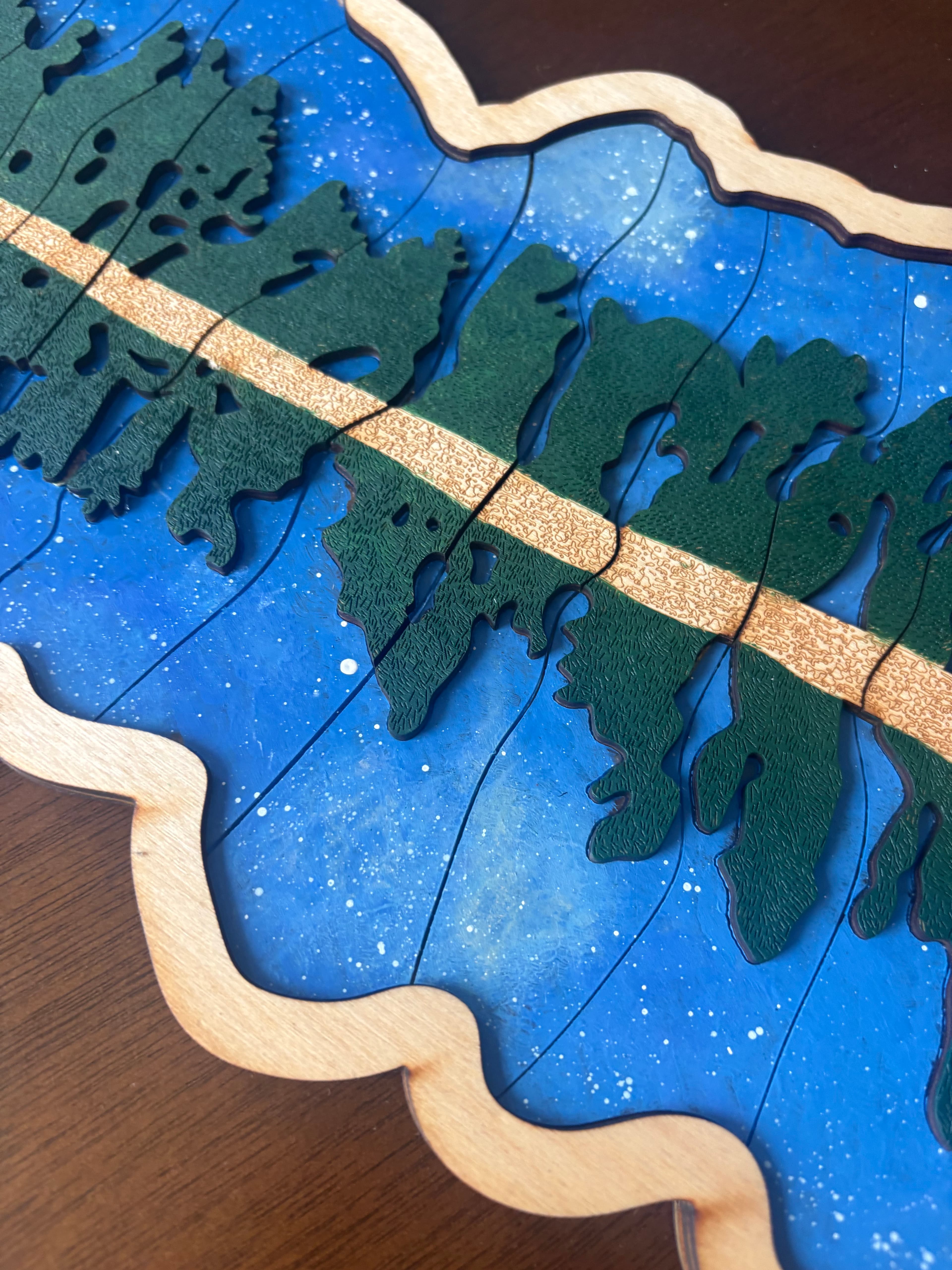 Detailed view of Pine Puzzle branches, surface, and piece divisions